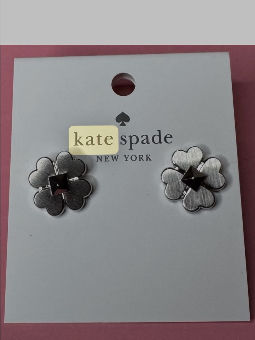 kate spade silver floral stud earrings with black center stones